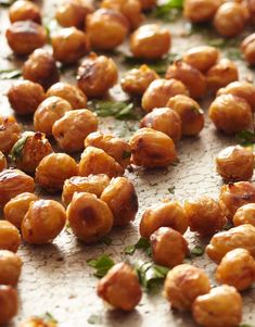 roasted chickpeas with parsley on a baking sheet