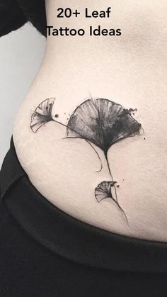 a woman's stomach with tattoos on it and the words 20 + leaf tattoo ideas