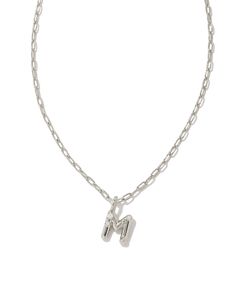 Personalize your everyday look with the Crystal Letter M Silver Short Pendant Necklace in White Crystal. Whether you’re rocking your initial or a loved one’s, this sentimental layer is one you’ll keep coming back to again and again. Metal Rhodium Over Brass Material White CZ Closure Lobster clasp Size 16" chain w/ 3" extender, 0.62"L X 0.35"W pendantDue to the one-of-a-kind nature of the medium, exact colors and patterns may vary slightly from the image shown. | Kendra Scott Crystal Letter M Sil Steve Madden Mules, Short Pendant Necklace, Eyewear Kids, Silver Shorts, Letter Pendant Necklace, Again And Again, Letter Pendants, White Crystal, Kids Jewelry