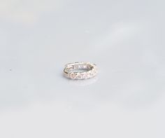 Very Tiny 6mm CZ diamond eternity ring - huggie hoop - Rook - cartilage - helix - lobe earring Listing : single - Material : Sterling silver - 1.5mm Swiss star cut CZ diamond - 18 gauge, 6mm diameter Available color: - Sterling silver - 14 k gold plated - Rose gold plated suitable for Rook/helix/cartilage/lobe/tragus piercing Huggie stye : A hinge is located at the top of the earring that allows the post to open and close without an earring back. For SMALLER diameter supper tiny 5mm available as Silver Diamond Huggie Cartilage Earrings, Silver Huggie Piercings With Prong Setting, White Gold Cubic Zirconia Huggie Cartilage Earrings, Silver Cubic Zirconia Huggie Ear Cuff, White Gold Huggie Ear Cuff, Small Hoop Cubic Zirconia Cartilage Earrings For Anniversary, White Gold Internally Threaded Huggie Cartilage Earrings, Cubic Zirconia Huggie Cartilage Earrings For Wedding, Silver Halo Huggie Earrings