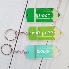 "Personalized Teacher Name Acrylic Colored Pencil Key chain with Tassel, Great Pre School Teacher Appreciation Gift. Great Teacher Appreciation gift for your child's favorite teacher's keys! Chose tassel from drop down box. This listing is for ONE (1) Personalized key chain with your child's or teacher's name - great backpack or lunchbox tag, a super cute gift. Acrylic keychain measures 3\", plus approx 2\" of keychain. Design is custom cut vinyl, personalization will be black vinyl. Leave teach Personalized Green Craft Supplies For Gift, Green School Craft Supplies With Pen Holders, Blue Pencil-shaped Craft Supplies For Gifts, Cute Stationery For End Of School Year Gift, Cute Green Keychains For Gifts, Customizable Educational Craft Supplies For Gifts, Personalized Pencil Craft Supplies For Gifts, Personalized Educational Stationery For Gifts, Green Rectangular Craft Supplies For School