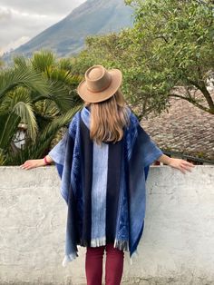 This poncho is made of baby alpaca yarn, one of the finest yarns in the world. It is lightweight, but warm and very soft and won't itch. Colours and patterns might differ slightly from the photo shown as of handmade nature of each item. One size fits most: 45" W x 35" H +2" fringe (116 cm W x 90 cm H + 5 cm fringe) Approx. Weight: 1.5 lbs Materials: Baby Alpaca Wool blend An alpaca (Vicugna pacos) is a domesticated species of South American camelid. It resembles a small llama in appearance.Alpac