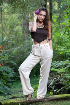 Our Hand-Made Natural Cotton Harem Pants are made with soft and breathable 100% hand-woven khadi cotton, these trousers are super comfortable making them perfect for yoga, festivals and day-to-day earth dwelling. Unisex, featuring two pockets and a string tie for personalised fitting. Hand made with Love ❀ Bohemian Straight Leg Harem Pants For Beach, Bohemian Linen Bottoms With Pockets, Casual Beige Yoga Pants, Relaxed Fit Conscious Cotton Bottoms, Casual Wide Leg Bottoms In Natural Color, Beige Cotton Yoga Bottoms, Cotton Hippie Straight Pants, Hippie Cotton Bottoms For Meditation, Hippie Cotton Straight Pants