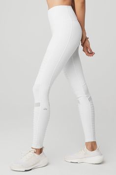 Our all-star, street-ready Moto gets an on-trend update in our patented High-Waist Moto Legging. It’s the lifting fit, contouring mixed matte/shine fabric and forward mesh panels of the original, now with a hold-it-in five-inch waistband. Om-azing. Engineered to lift, sculpt, contour and smooth Wear-tested by our in-house team for the perfect fit 4-way-stretch fabric for a move-with-you feel Moisture-wicking odor resistant technology On-trend high waist Alo Yoga® | High-Waist Moto Legging in Whi Flex Leggings, Style Leggings, Moto Leggings, Tank Top Bras, Womens Capris, Alo Yoga, Lookbook Outfits, Yoga Wear, Athletic Wear