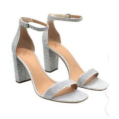 Inc International Concepts Women's Silver Sandals Step Into A World Of Elegance And Sophistication With The Inc International Concepts Women's Silver Sandals. Crafted With High-Quality Materials, These Sandals Are Not Just A Treat For The Eyes But Are Also Designed To Provide Unmatched Comfort, Making Them Perfect For Both Daily Wear And Special Occasions. Their Sleek Silver Finish Adds A Touch Of Glamour To Any Outfit, Ensuring You Stand Out In The Crowd. Whether You're Attending A Summer Weddi Sparkling Open Heel Sandals For Summer, Adjustable Low Heel Sandals For Party, Sparkling Open Toe Heels For Spring, Chic Sparkling Summer Heels, Chic Sparkling Heels For Summer, Sparkling Synthetic Heels For Summer, Sparkling Low Heel Summer Heels, Sparkling Open Heel Heels For Summer, Summer Sparkling Synthetic Heels