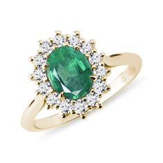 Ring with Emerald and Brilliants in Gold Luxury Green Oval Cluster Ring, Oval Yellow Gold Emerald Ring With Halo, Green Oval Diamond Ring With Halo Setting, Oval Green Diamond Ring With Halo Setting, Oval Emerald Ring In Yellow Gold With Halo Setting, Green Oval Diamond Halo Ring, Oval Green Diamond Halo Ring, Formal Oval Green Cluster Ring, Formal Green Oval Cluster Ring