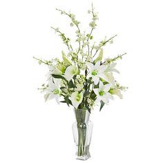 a vase filled with white flowers on top of a table