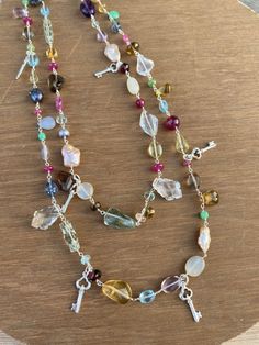 925 Silver Chain Gemstone Necklace Gross Weight 68.89 Gram Silver Weight 10.09 Gram length - 24 inch size - 10x19 mm gemstone name - smoky , pink sapphire , tz , blue topaz, white onyx , lemon quartz , chrysoprase , amethyst , ruby , green amethyst , pink amethyst , chalcedony , pink sapphire , crystal , pearls gemstones jewelry by Prismatic Gems gemstones long necklace We even do Custom order, Please write us a message or email us on info@gemprism.com Multi Gemstone Necklace, Gemstone Beads Wholesale, Pearl Gifts, Natural Gemstone Necklace, Amethyst Quartz, Pink Amethyst, Pearl Gemstone, Lovely Jewellery, Silver Chain Necklace