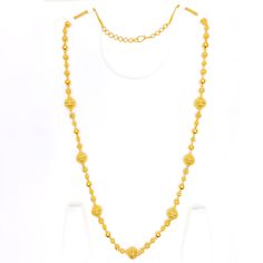 This handmade chain is a celebration of craftsmanship and tradition, made from 22k yellow gold that adds a warm, radiant glow to any attire. Weighing 60.0 grams, it boasts a substantial presence, signifying its high quality and durability. The chain extends over a length of 30 inches, adorned with beads that reach up to 13.25 mm in width, providing a striking visual impact. It features 1.7 inches of adjustable links, offering versatility and a personalized fit, complemented by a secure hook lock Yellow Gold Necklaces With Round Beads, Gold Plated Round Bead Necklaces For Festivals, Gold Plated Round Beads Necklace For Festivals, Gold Plated Beaded Necklaces For Festivals, Traditional Long Necklace With Beaded Chain And Round Beads, Traditional Long Necklace With Round Beaded Chain, 22k Gold Jewelry With Pearl Chain, Traditional Long Necklace With Beaded Chain, Yellow Gold Pearl Chain Temple Necklace