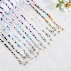 Feature: 100% Brand new and high quality Description: Item Type:Mask Hanging Chain Style:Popular Size:70cm (1cm=0.39inch,1inch=2.54cm) Color: multicolor,blue,dark blue,black,purple,white Material:Glass rice beads Packing:1PC Note: Please allow1-2% measuring deviation due to manual measurement. Due to the difference between different monitors, the picture may not reflect the actual color of the item. Thank you! Beaded Sunglasses, Fashion Reading Glasses, Eyewear Chain, Eyeglass Strap, Eyeglass Necklace, Glasses Strap, Chain Lanyard, Bohemian Colors, Rice Bead