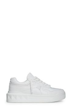 A single Maxi stud marks the intersection of quilting seams on this Italian sneaker featuring a whiteout design. Lace-up style Leather upper and lining/rubber sole Made in Italy Men's Designer Shoes White Sneakers With Contrast Stitching For Sports, White Casual Sneakers With Contrast Stitching, Casual White Sneakers With Contrast Stitching, White Low-top Sneakers With Contrast Stitching, Italian Sneakers, Mens Designer Shoes, Sneaker Men, Up Styles, Sneaker Boots