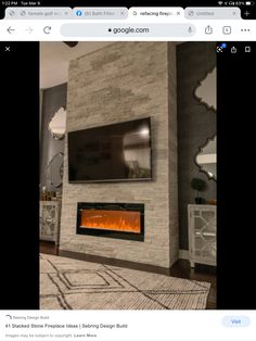 an image of a fireplace in the middle of a living room with a flat screen tv above it