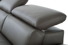 the reclining chair is made from grey leather