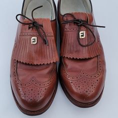 Vintage Footjoy Kiltie Loafer Derby Men's Golf Shoes Leather Kiltie Cover Real Leather Laces Derby Shoes Golf Shoes Missing Spikes All Leather Soles & Upper Cushioned Insole Heavy Shoe (All Leather) Cleaned & Disinfected Size 10 Color: Cognac Heel: 1" Inch Insole: 10.75"Inches (Toe-Heel) Toe Wide Box: 3.5" Inches Measurements Are Measured To My Best Ability. As Always, There Could Be A Discrepancy In Inches (Plus Or Minus) The Measurements Provided See Pictures For Details If You Have Any Questions, Send Me A Message Smoke-Free Home See Anything Else In My Closet And Add It To Your Bundle. The Items Will All Cognac Heels, Golf Shoes Mens, Leather Cleaning, Golf Shoes, Derby Shoes, Vintage Shoes, Leather And Lace, Cognac, Real Leather