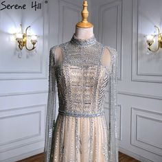 SERENE HILL Grey Arabia Luxury Beaded Cape Sleeves Evening Gown 2025 For Women A-Line Formal Party Evening Gown 2023, Arabic Luxury, Gown 2023, Beaded Cape, Evening Gowns With Sleeves, A Line Evening Dress, Formal Dresses Gowns, Evening Dress Fashion, Cape Sleeves