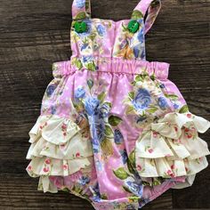 Nwot Htf Matilda Jane 6 Mth Good Hart “Bubbles” Romper! This Is A Mj Size 6m. However It Runs Large Imo-We Tried On At 12m And It Fit! Kept The 12m Size So This 6m Is New! Please Be Ware. That’s Why I Tried Listing It 6-12. Note: I’ve Seen This Romper In Guc / Vguc Condition Go For $75-$100. Asking Reasonable Price, Based On How Rare This Romper Is To Find In New Condition! Also, The Headboard Is Not Included, Just For Demo. Playful Pink Floral Print Bubble Romper, Pink Floral Print Bubble Romper For Playtime, Purple Cotton Bubble Romper For Spring, Pink Fitted Floral Print Bubble Romper, Sleeveless Purple Bubble Romper For Spring, Spring Sleeveless Purple Bubble Romper, Spring Purple Sleeveless Bubble Romper, Cute Purple Bubble Romper For Spring, Bubble Romper