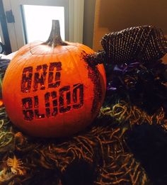 an orange pumpkin with the word boo boo written on it