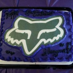 a birthday cake with an image of the fox on it