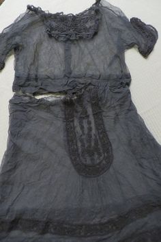 "Antique all Lace Overlay type dress.  Three Separate pieces; a top and a skirt - (and an extra piece)  ALL LACE, and was later (according to accompanying record) dyed black.  Possibly for Mourning?  The back has SNAPS for closure.  The skirt has a raw top edge.  There are 3 pieces:  the bodice top, the skirt, and an extra circle of lace shown in photo 9.  This antique lace dress was worn in 1915 by Marjorie Nettleton who married John Peyton Torbert on 30 June 1915.  The wedding was in Washingto Antique Lace Dress, Scalloped Sleeves, Squared Neckline, Mr Und Mrs, Bodice Top, Antique Lace, Lace Wedding Dress, Lace Overlay, Washington Dc