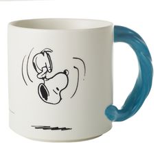 a coffee mug with a drawing of a man riding a skateboard on the side