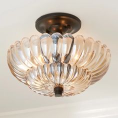 a close up of a light fixture in a room