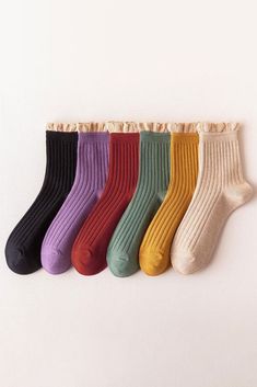 There are few better feelings than sliding your foot into a brand new pair of socks. With the Matilda Crew Socks you get that and the comfort of knowing you are wearing the cutest socks on the block. The perfect amount of beige trim lines the top of each one... let 'em peek a little, they like to show off! With a top 6 lineup of colors you can't go wrong! Your feet will thank you and so will your outfit! Comes in 6 colors black, brick red, coffee, green, purple, and yellow 98% cotton 2% spandex Beige Trim, Art Outfits, Red Coffee, Black Brick, Cute Socks, Trendy Earrings, Crew Shirt, Brick Red, Business Attire