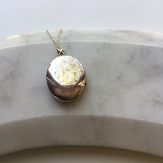 This beautiful vintage locket has an engraved scroll pattern on the front and a plain back. It comes on a modern sterling silver 18" chain or with no chain, please select which from the dropdown box.Hallmarked with the makers mark 'ZJ' and Sterling Silver 925 on the bail.Locket measurements: 3.2cm height, 2.5cm width, 0.7cm depth.The necklace will come beautifully presented in a Lime Tree Design box.IMPORTANT INFORMATION REGARDING SHIPPING:Orders to UK addresses are sent using Royal Mail  which Oval Locket Necklace, Locket Necklace Vintage, Silver Locket Necklace, Vintage Locket, Design Box, Lime Tree, Oval Locket, Silver Locket, Vintage Lockets