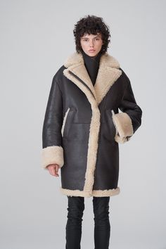 Women's B7 Shearling Leather Coat In Black Arcane Fox Black Shearling Fur Coat For Fall, Black Shearling Leather Jacket With Faux Fur Trim, Luxury Black Sheepskin Fur Coat, Black Sheepskin Leather Jacket With Faux Fur Trim, Black Sheepskin Fur Coat With Faux Fur Lining, Black Sheepskin Long Coat, Black Shearling Fur Coat For Cold Weather, Black Sheepskin Fur Coat For Winter, Black Sheepskin Fur Coat For Cold Weather