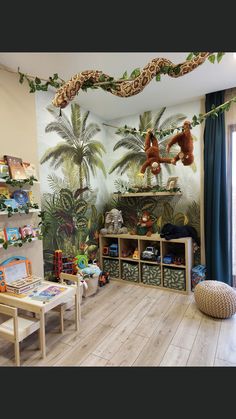 a child's playroom with toys and stuffed animals