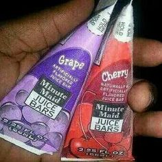 two hand holding three different flavors of juice bars in their palm - sized packagings