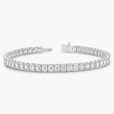 Finish your look with luxurious sparkle when you wear this classic tennis bracelet crafted from 14k white gold. The emerald-cut diamonds along its length shimmer brilliantly as they catch the light. Diamond Tennis Bracelet, Tennis Bracelet Diamond, Blue Nile, Emerald Cut Diamonds, Bracelet Crafts, Emerald Diamond, Tennis Bracelet, Emerald Cut, Diamond Cuts