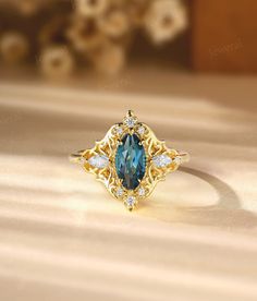 I hope the jewelry I design can heal you and bring you good mood, I wish you all the best! ❤ Setting Details ☆ Metal: 10K Solid Gold, Gold Plated, Sterling Silver ☆ Gold Color: Rose / White / Yellow ❤ Main Stone Details ☆ Type: London Blue Topaz ☆ Shape: Marquise ☆ Size: 10*5 mm ❤ Side Stones Details ☆ Type: Moissanite ☆ Total Carat Weight: approx 0.196 ct ☆ Shape: Marquise & Round ☆ Color: DEF ☆ Clarity: VVS-VS ☆ Weight of gold: about 3.51 g ☆ Band width: 1.9 mm ☆ Band Thickness: 1.25 mm ☆ Ring Sapphire Ring Jewelry For May Birthstone, Sapphire Ring As May Birthstone Jewelry, Aquamarine Rings With Gemstone Accents As Gift, Turquoise Topaz Ring With Gemstone Accents As Gift, Gift Rings With Aquamarine And Gemstone Accents, Heirloom Topaz Ring With Gemstone Accents As Gift, Heirloom Aquamarine Rings For Gifts, Blue May Birthstone Jewelry For Anniversary, Gift Topaz Ring With Aquamarine Gemstone Accents