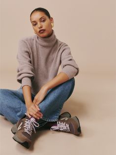 Get your steps in and look damn good doing it. Shop the Veja X Ref Venturi Sneakers from Reformation, a thick-soled, super cushioned sneaker. Veja Venturi, Emily Cooper, Sleeveless Turtleneck Sweaters, Chanel Boots, Oversized Turtleneck, Sleeveless Turtleneck, Trending Sneakers, Brown Sneakers, Winter Fits