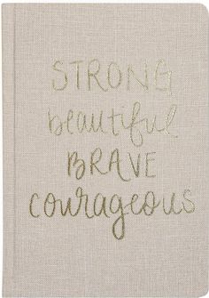 a cross stitch book with the words strong beautiful brave courageous written in cursive font