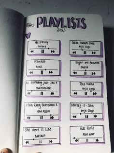 an open book with playlists written on it