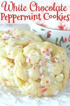 white chocolate peppermint cookies on a plate next to a bowl of candy canes