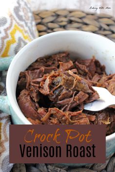 a white bowl filled with crock pot venison roast