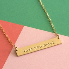 Love you most, personalized hand stamped bar necklace Minimalist Customized Nameplate Charm Necklace, Personalized Engraved Nameplate Necklace, Engraved Nameplate Bar Necklace For Personalized Gift, Personalized Name Bar Necklace, Mother's Day Gold Nameplate Bar Necklace, Customizable Nameplate Bar Necklace As Gift, Customizable Nameplate Bar Necklace For Gift, Personalized Nameplate Bar Necklace, Gold Nameplate Bar Necklace For Mother's Day