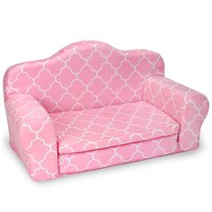 a pink and white chair with an intricate pattern on the armrests, sitting in front of a white background