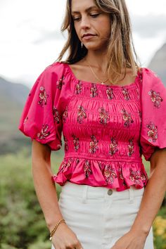 THIS SALE ITEM IS FINAL SALE The Roxy Top-Hot Pink is an ultra-feminine pick for any occasion. Its paisley pattern, smocked bodice, puff sleeves, and peplum style add a flirty touch to the timeless square neckline. Whether you choose to dress it up or down, the Roxy Top guarantees you'll stand out from the crowd! *Cropped; smocked bust* Material Content: 100% Polyester Material Pattern: Paisley Montana is 5’8” wearing a small Model Measurements: Montana Height: 5'8" // Chest: 33" // Waist: 25.5" Feminine Fitted Peplum Top With Puff Sleeves, Spring Fitted Peplum Top With Smocked Back, Ruched Fitted Peplum Top For Spring, Brunch Peasant Top With Smocked Bodice, Fitted Ruched Peplum Top For Spring, Spring Peplum Top With Smocked Bodice And Puff Sleeves, Fall Smocked Top With Short Sleeves, Short Sleeve Smocked Top For Fall, Spring Smocked Bodice Peplum Top With Puff Sleeves