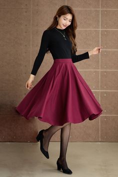 Discover elegance in our wine-red wool pleated midi skirt, a timeless addition to your winter wardrobe. The rich wine-red hue exudes sophistication, while the premium wool fabric ensures warmth and comfort.  DETAILS: * 30% wool, 30% fiber, 40% polyester * Fully satiny liner * Two side pockets * Left zipper closure * Left buttons decoration * Pleated skirt, circle skirt * Back elastic waist * High waist skirt * Below the knee skirt * Perfect for Winter, autumn * Dry clean * Lean More about the items From the FAQs on the page bottom MODEL SIZE Bust 85 cm(33.4") Waist 67 cm(26.7") Height 168cm (5' 6") She wears size XS CUSTOM MADE SERVICE If you * Change other color * Can't find your size in our size Chart * Change the Style * Change the length * Your Height is not Between 5'1" - 5"9" * Your Midi Skirt Winter, Custom Skirt, Skirt Circle, Wool Midi Skirt, Below The Knee Skirt, Burgundy Skirt, Knee Skirt, Knee Skirts, Winter Skirt