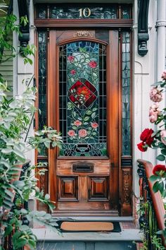 Homes With Stained Glass Windows, Front Door Stained Glass Entrance, Boho Front Door Ideas, Stained Glass Front Door Ideas, House With Double Front Doors, Unique Screen Doors, Stained Glass Entry Doors, Stained Glass Doorway, Stained Glass Window Door