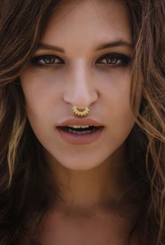 "14K Solid Gold Septum Ring, Daith Earring, also fits Helix, Tragus, Cartilage Earring Jewelry, Tribal Unique Earring, Teardrop Geometric Septum, available in 18g oooo Septum rings are super on-trend jewelry. Find a septum ring that works best for your personality. You could go subtle and rock a simple one, or you can go bold! This septum ring is made of 14K solid gold and is a part of my INDIAN Collection. A beautiful septum ring is decorated with handmade gold balls in 3 different sizes, attac Internally Threaded 14k Yellow Gold Nose Rings, 14k Yellow Gold Internally Threaded Nose Rings, Hypoallergenic 14k Yellow Gold Nose Rings, 14k Gold Septum Ring With Halo Detail, 14k Gold Septum Ring, Gold Halo Septum Ring For Wedding, 14k Gold Septum Ring With Halo, Wedding Yellow Gold Internally Threaded Nose Rings, 14k Gold Halo Septum Ring