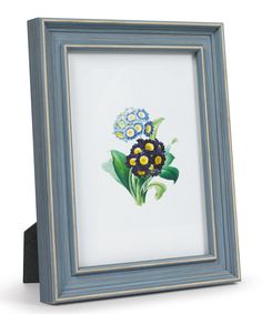 a blue frame with flowers painted on it