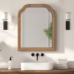 a bathroom with a sink and mirror on the wall