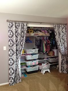 the closet is organized and ready to be used as a clothing storage area for children