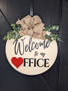 welcome to my office door sign with burlap bow and greenery on it