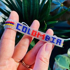 "Beaded Colombian Wristband. Made with ❤️ Mostacilla also known as Chaquira beads, representing the Colombian flag.  ♦️The opening of the bracelet is 12\" inches, and the actual beaded part is 6\" There is a macrame knot to adjust the size you desire. Simply pull to open and close. This listing is for 1 bracelet only.  Your jewelry is guaranteed and I will always be here to address any concerns.  To request a custom order or sizing, express shipping  and all other inquires please message me. Thank you for supporting handmade! If you'd like to view some of our other items you may Click this link.  https://www.etsy.com/shop/colombianchic Follow ColombianChic on Facebook, Pinterest and Instagram." Colombian Bracelets, Ecuadorian Flag, Colombian Jewelry, Colombian Flag, Colombian Culture, Bracelet Friendship, Macrame Knot, Personalized Bracelets, Cute Bracelets