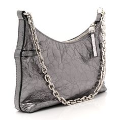 This is an authentic GIVENCHY Metallic Calfskin Mini Voyou Bag in Silver. This sleek bag is crafted of metallic laminated calfskin in silver. The bag features an adjustable leather shoulder strap with silver hardware. The top opens to a black fabric interior with a zipper pocket. Mini Antigona, Pandora Black, Bag Silver, Diamond Quilt, Pearl Grey, Wallet Chain, Black Cross Body Bag, White Bag, Silver Hardware