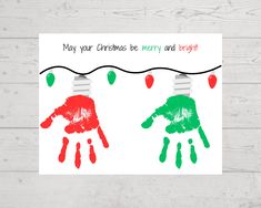 two handprints with christmas lights on them and the words may your christmas be merry and bright